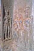 Angkor Wat temple, second enclosure, devatas sculpted in bas-relief with an extraordinary variety of intricate hair styles and costumes.